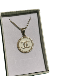 a chanel necklace in a gift box